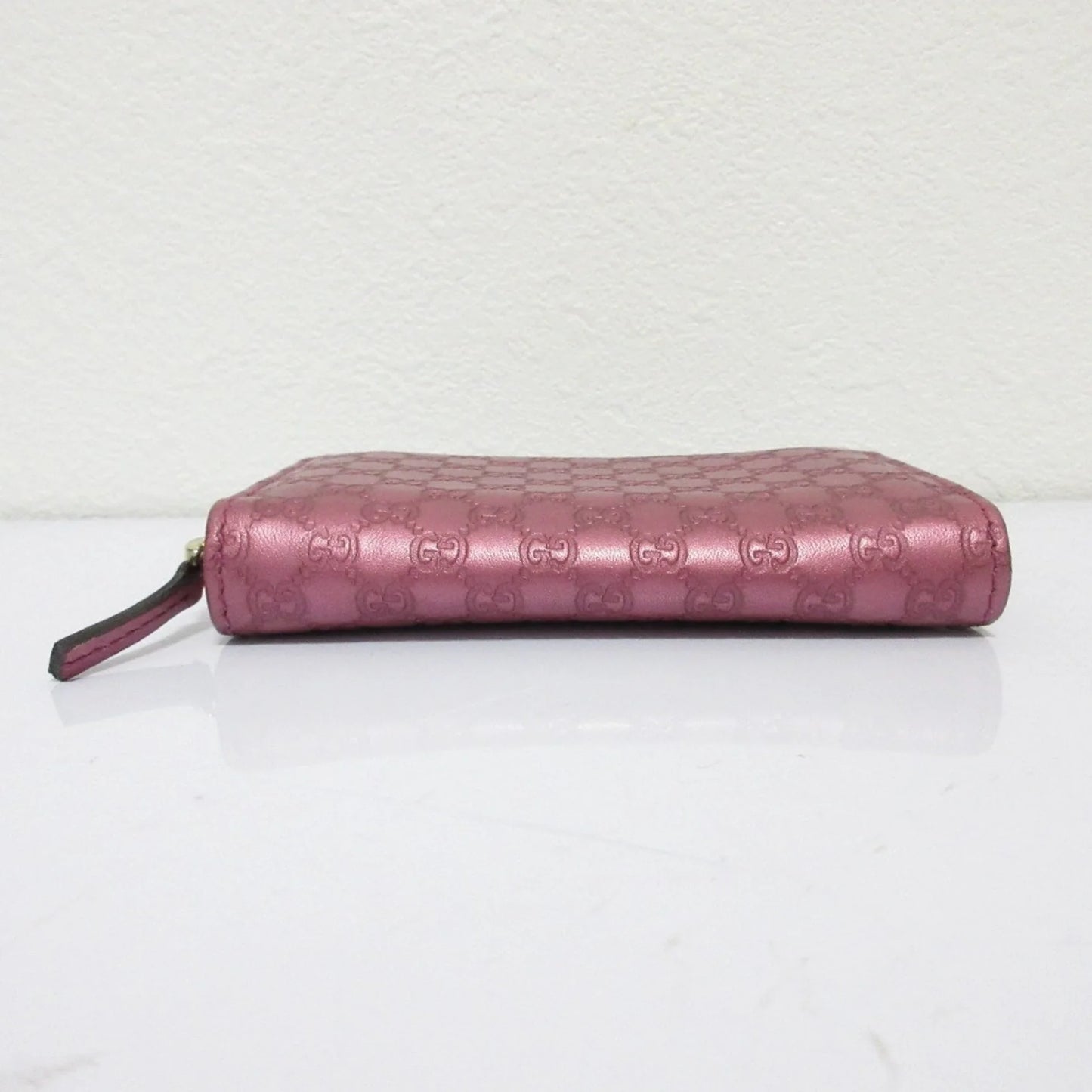 Gucci Portafoglio/portamonete in pelle Microsima con cerniera rotonda GUCCI, rosa metallizzato da donna