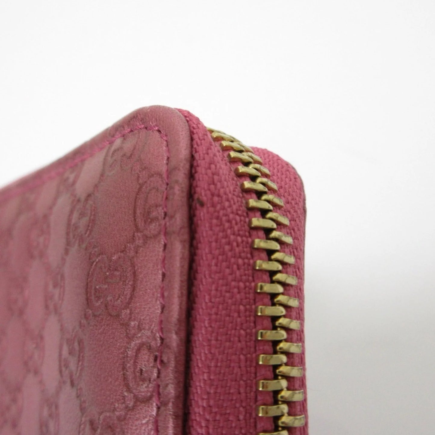 Gucci Portafoglio/portamonete in pelle Microsima con cerniera rotonda GUCCI, rosa metallizzato da donna