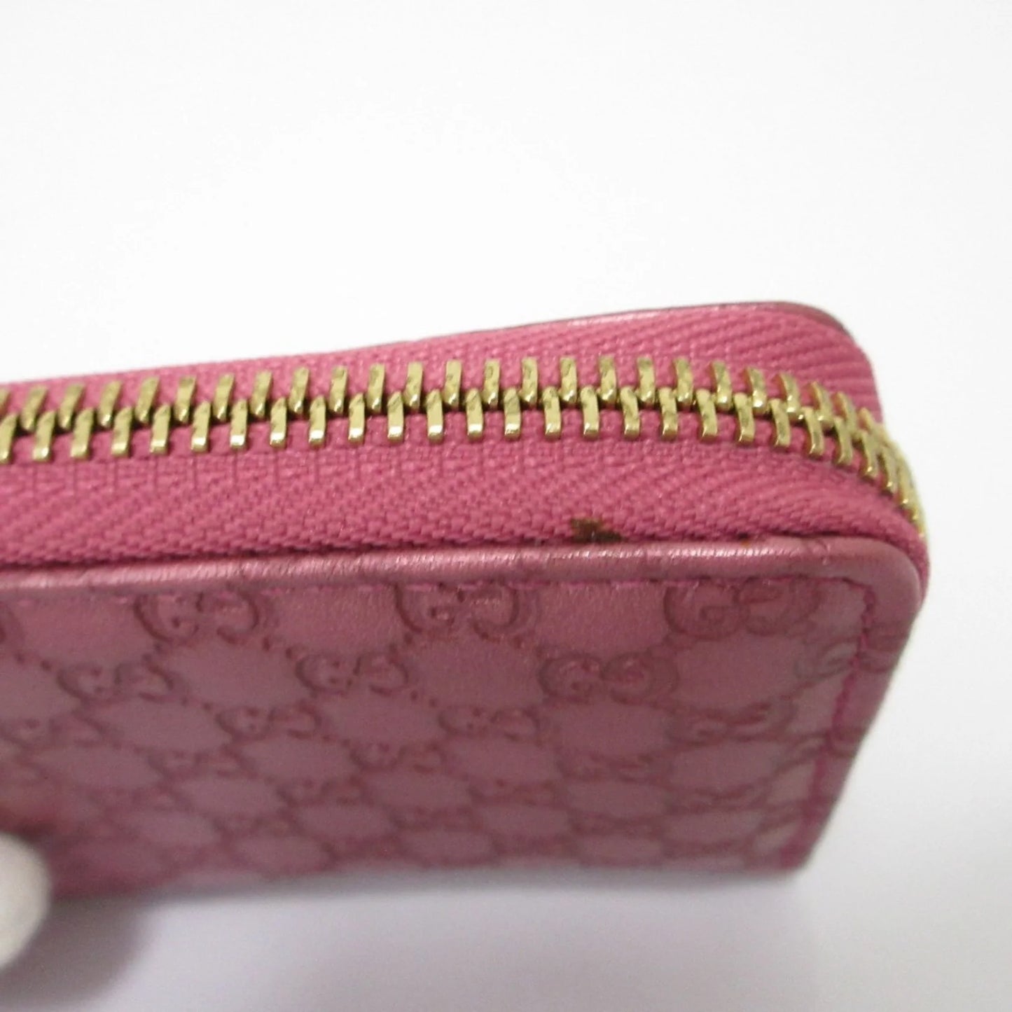 Gucci Portafoglio/portamonete in pelle Microsima con cerniera rotonda GUCCI, rosa metallizzato da donna