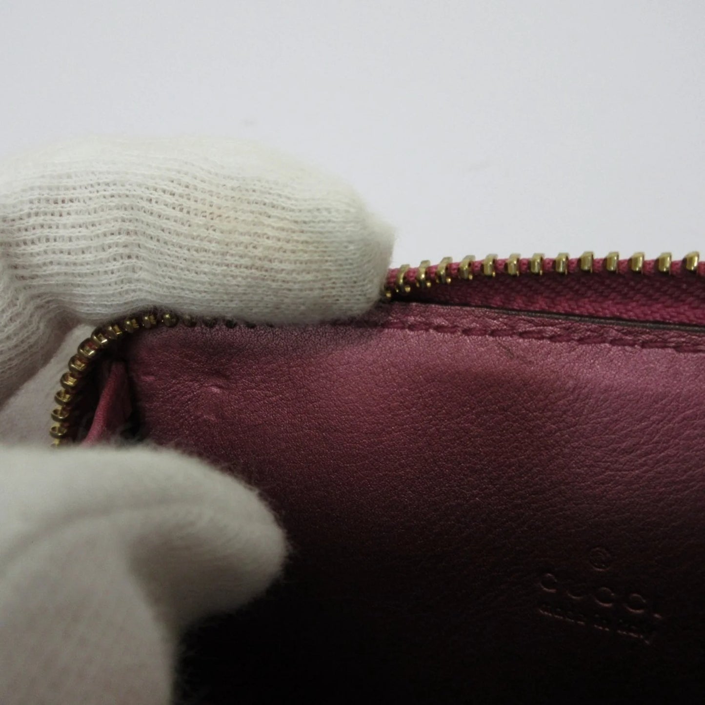 Gucci Portafoglio/portamonete in pelle Microsima con cerniera rotonda GUCCI, rosa metallizzato da donna