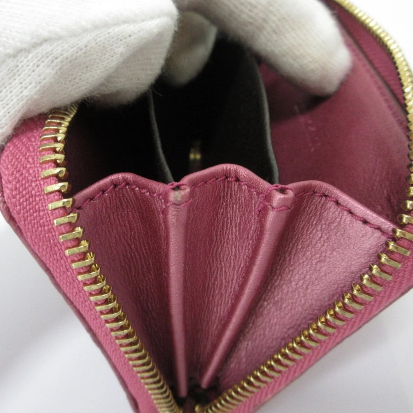 Gucci Portafoglio/portamonete in pelle Microsima con cerniera rotonda GUCCI, rosa metallizzato da donna