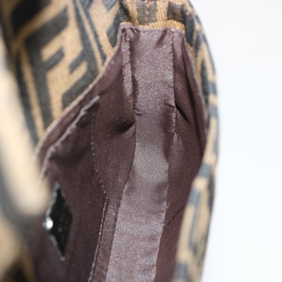 Fendi Baguette Mini Zucca Canvas e Pelle Nera – Made in Italy