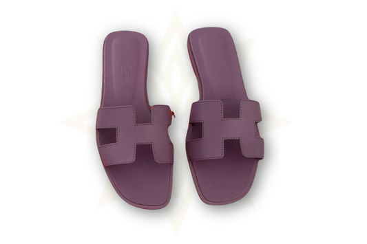 Hermès – Sandali Oran in pelle viola – Donna