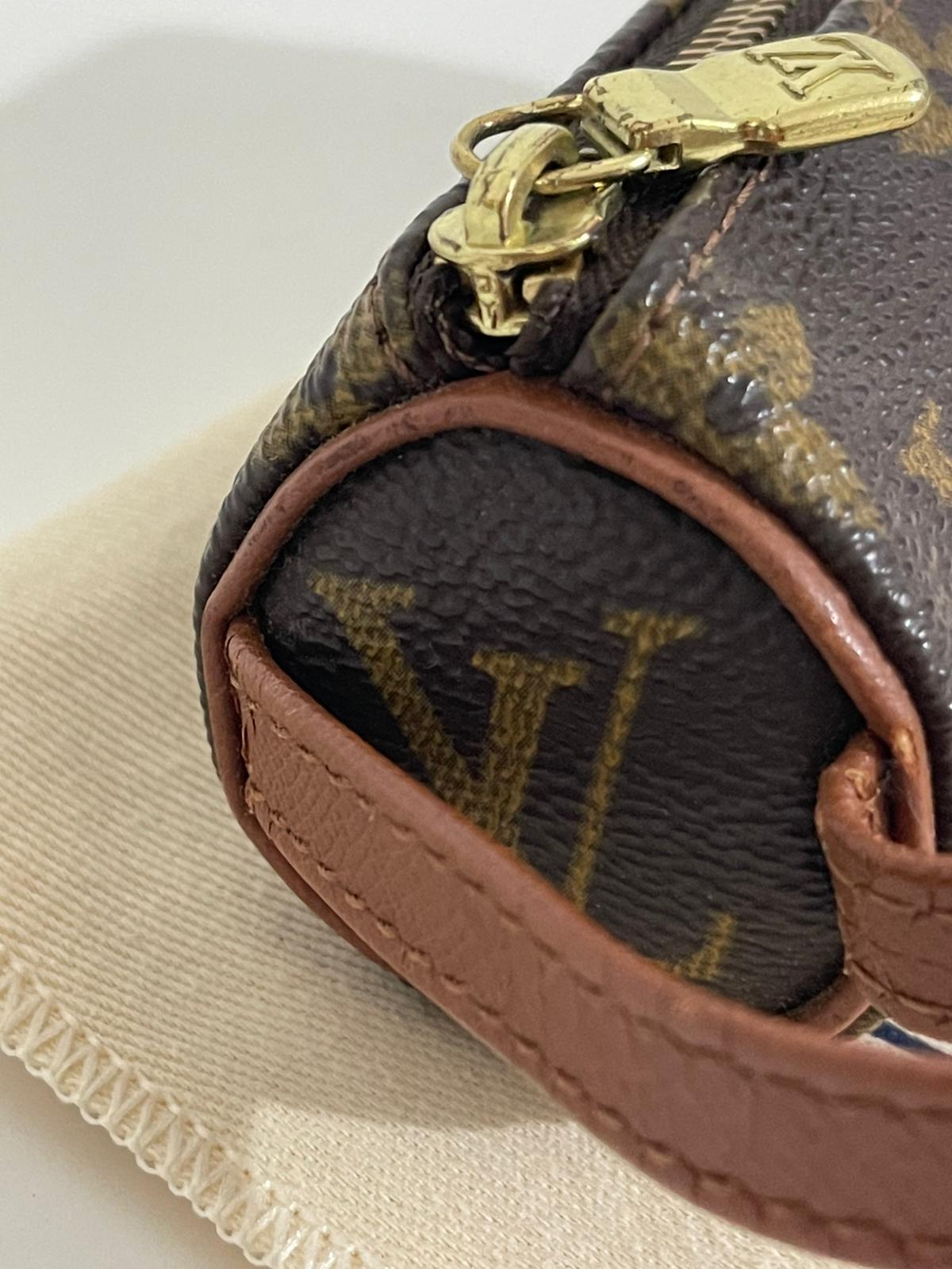 Louis Vuitton Mini Pochette Cylindrique Monogram – Porta Monete/Accessori