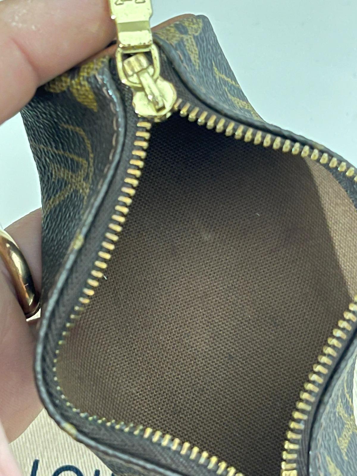 Louis Vuitton Mini Pochette Cylindrique Monogram – Porta Monete/Accessori