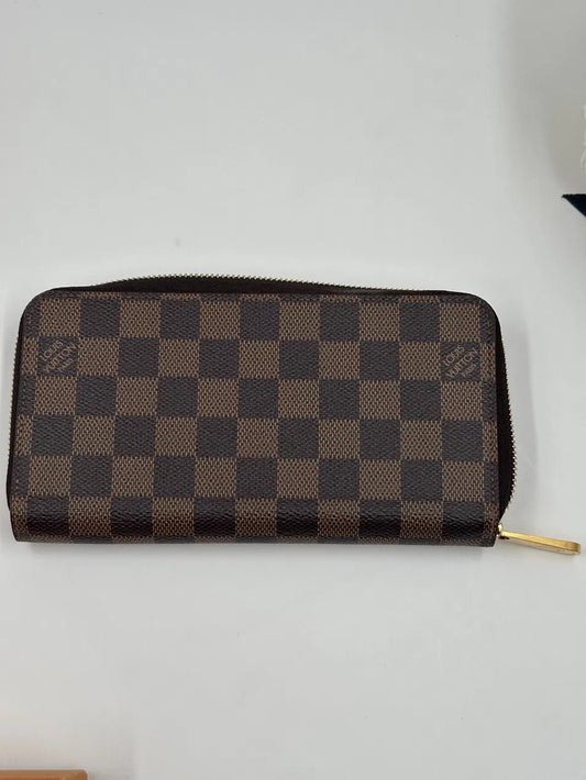 Louis Vuitton Portafoglio Zippy NM Damier Ebène 2023 – Etoilux
Meta