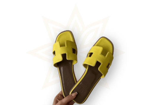 Hermes Sandali Oran Hermes in Pelle Giallo Limone - Etoilux