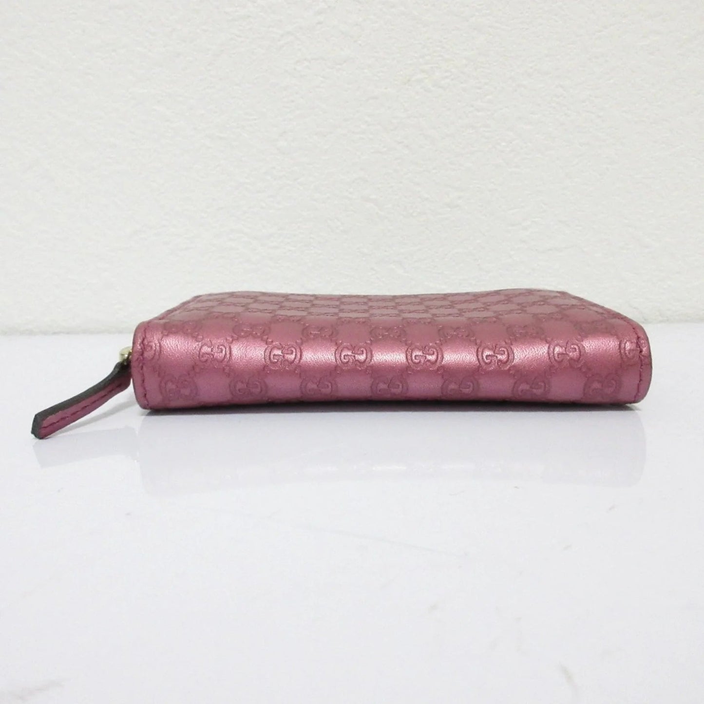 Gucci Portafoglio/portamonete in pelle Microsima con cerniera rotonda GUCCI, rosa metallizzato da donna - Etoilux