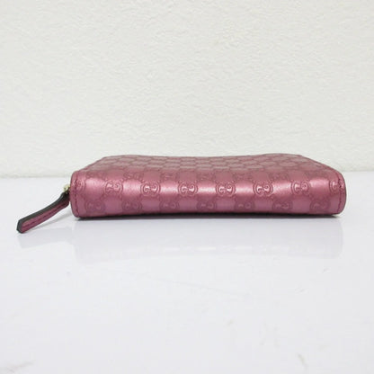 Gucci  Portafoglio/portamonete in pelle Microsima con cerniera rotonda GUCCI, rosa metallizzato da donna