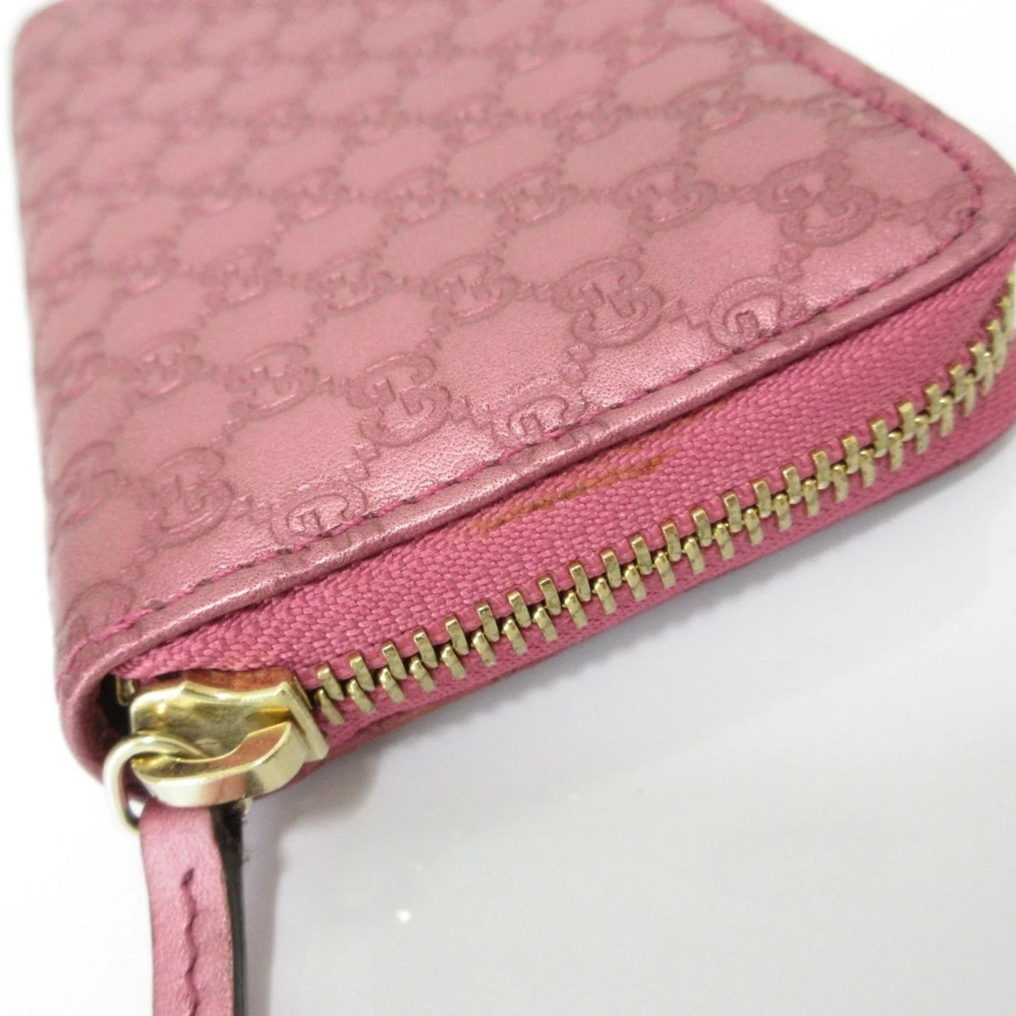Gucci  Portafoglio/portamonete in pelle Microsima con cerniera rotonda GUCCI, rosa metallizzato da donna