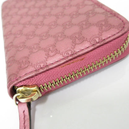 Gucci  Portafoglio/portamonete in pelle Microsima con cerniera rotonda GUCCI, rosa metallizzato da donna