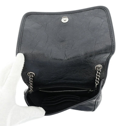 Saint Laurent  Borsa a tracolla con catena Saint Laurent Niki in pelle SAINT LAURENT PARIS Nero