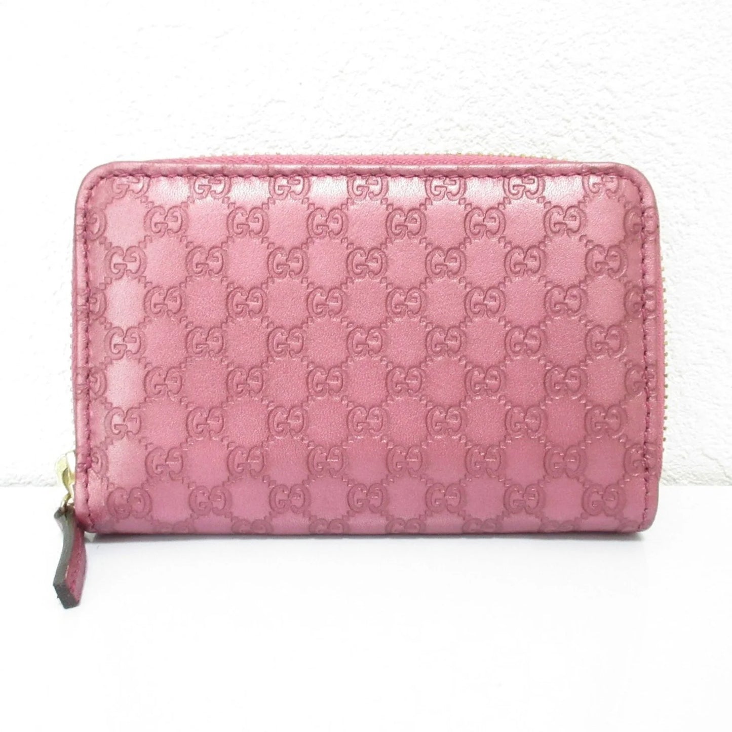 Gucci  Portafoglio/portamonete in pelle Microsima con cerniera rotonda GUCCI, rosa metallizzato da donna