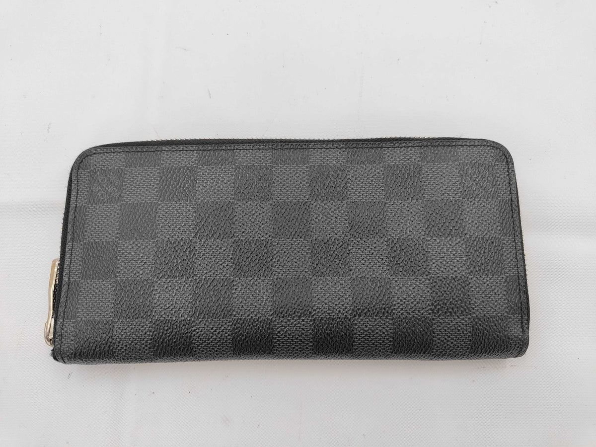 Louis Vuitton	Portefeuille Sarah