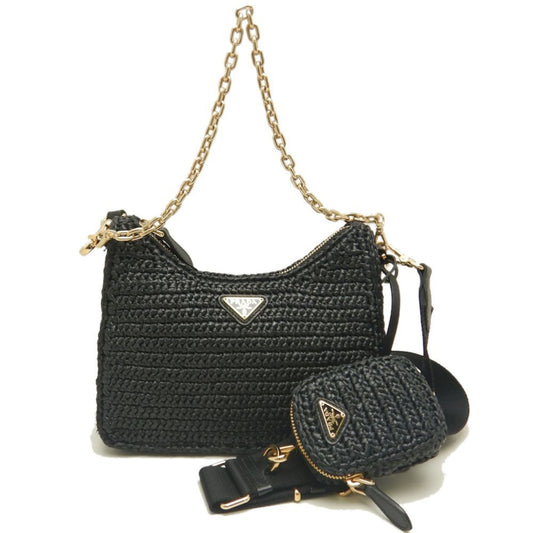 Prada Re-Edition 2005 – Borsa in rafia nera con pochette rimovibile
