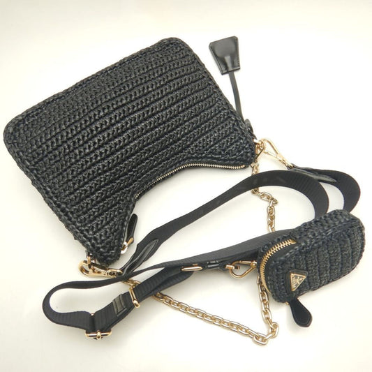 Prada Re-Edition 2005 – Borsa in rafia nera con pochette rimovibile