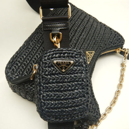Prada Re-Edition 2005 – Borsa in rafia nera con pochette rimovibile