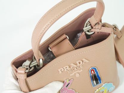 Prada Panier Bucket Bag in Saffiano Leather Beige – Limited Edition Pins