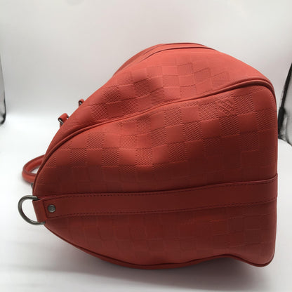 Louis Vuitton Keepall Bandoulière 55 Damier Infini Rosso Corallo, 2012 – 55 cm