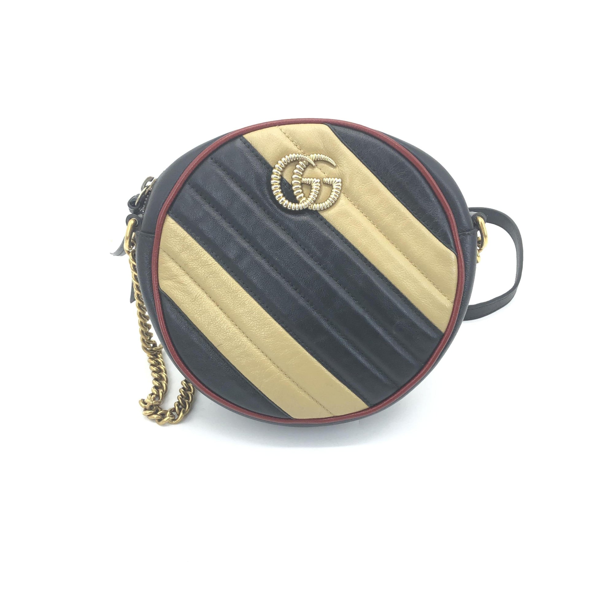 Borsa Gucci GG Marmont Round Mini pelle trapuntata torchon nera e panna con bordino bordeaux e catena dorata