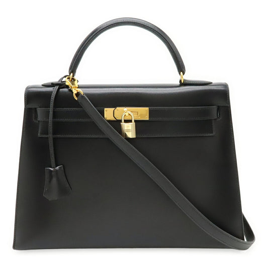 Hermès Kelly 32 in pelle nera con hardware dorato – vista frontale
