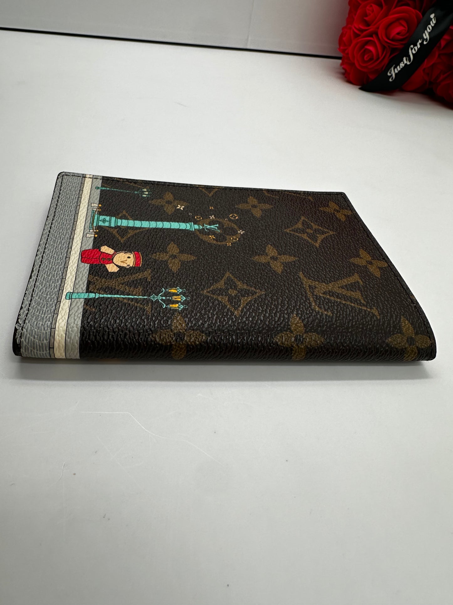 Louis Vuitton Passport Cover Christmas Animation "Paris" Monogram – Vivienne Edition, 2022