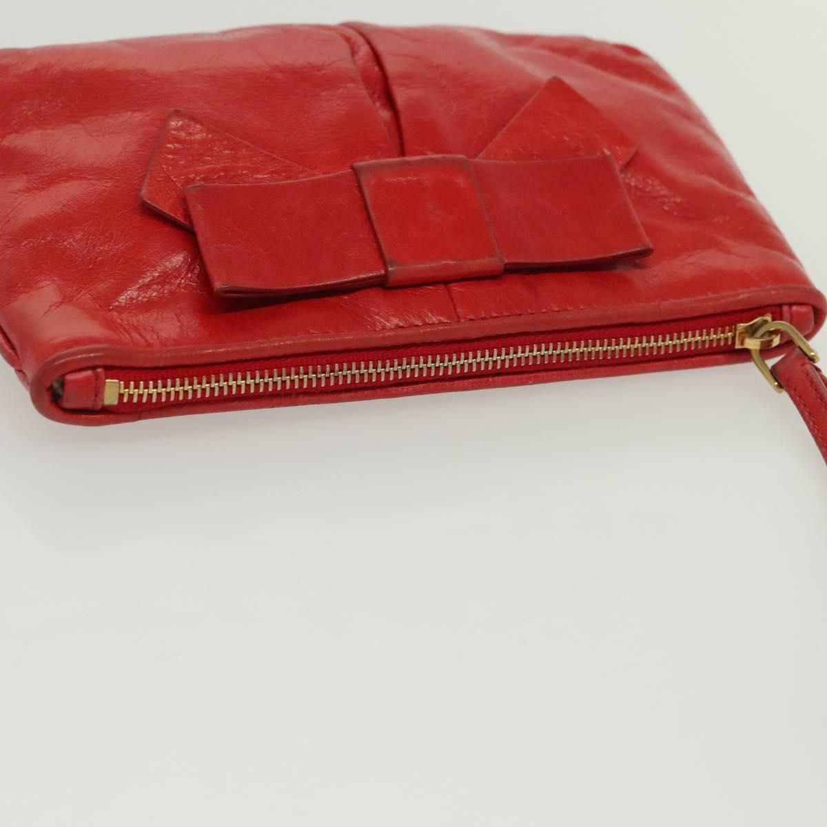 Miu Miu – Pouch in Pelle Rossa con Fiocco e Dettagli Dorati
