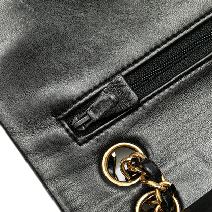 Chanel Classic Double Flap Small – Pelle di agnello nera – Serie 1 (1989–1991)