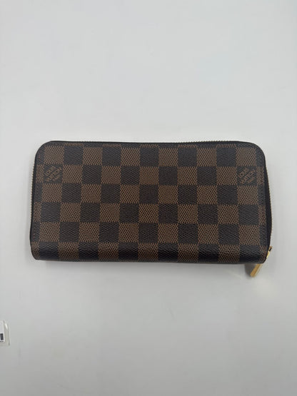 Louis Vuitton Portafoglio Zippy NM Damier Ebène 2023 - Etoilux