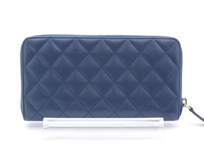 Chanel Portafoglio Matelassé Zippy Caviar Blu Navy – Hardware Oro – 19 cm - Etoilux