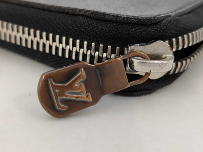 Louis Vuitton Zippy Verticale - Etoilux