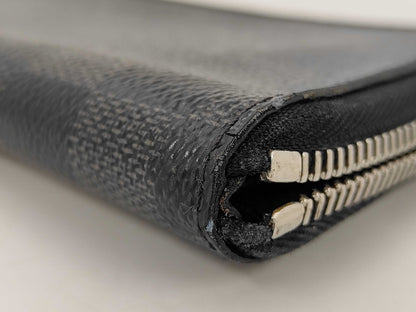 Louis Vuitton Zippy Verticale - Etoilux