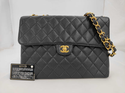 Chanel Classic Flap Jumbo caviar nero fronte con certificato