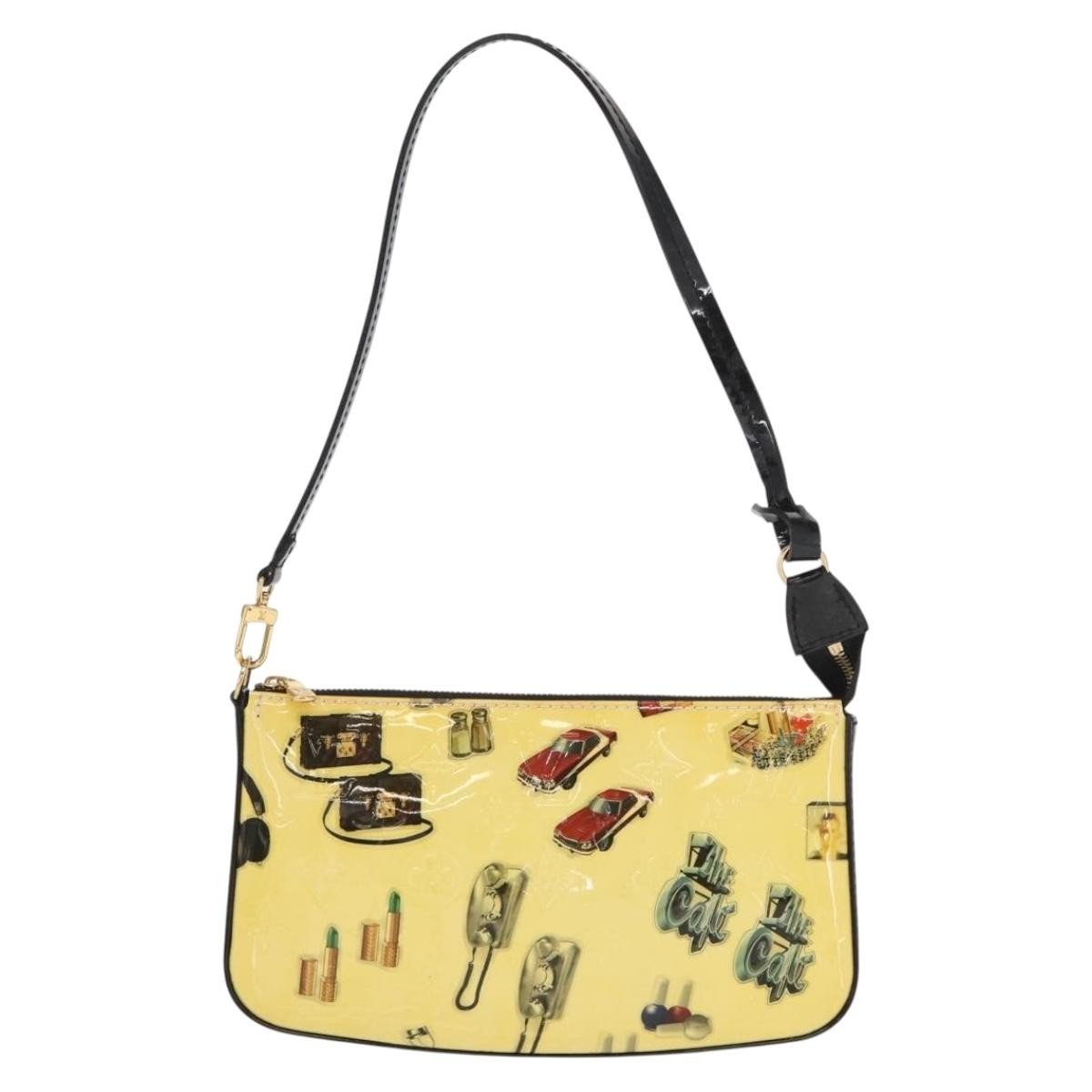 Louis Vuitton – Pochette Accessoires NM in Vernice Gialla - Etoilux