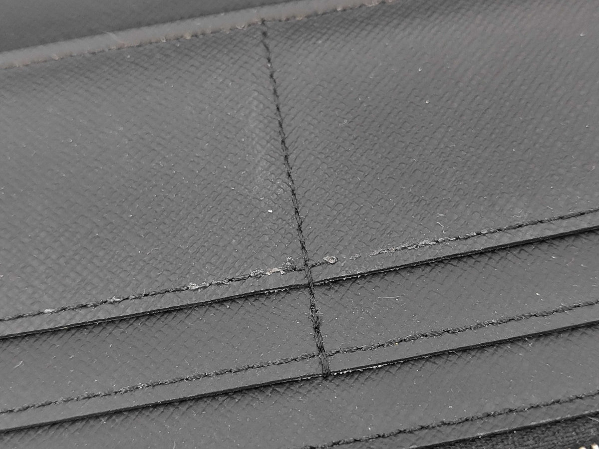 Louis Vuitton Zippy Verticale - Etoilux