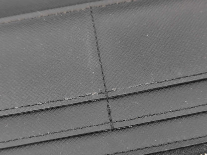 Louis Vuitton Zippy Verticale - Etoilux