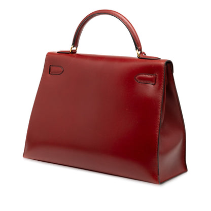 Hermès Kelly Retourne 32 Pelle Box Calf – Rosso – Hardware dorato - Etoilux