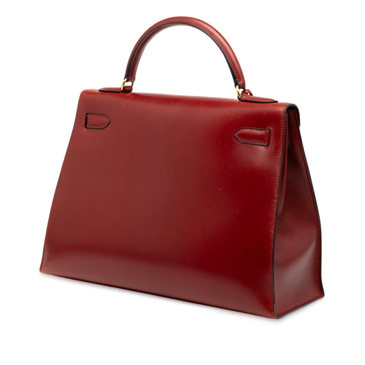 Hermès Kelly Retourne 32 Pelle Box Calf – Rosso – Hardware dorato - Etoilux