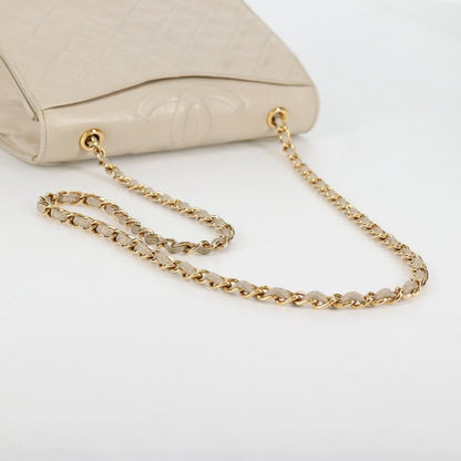 Chanel Vintage Mini Flap Bag con Nappina in Agnello Trapuntato – Oro - Etoilux