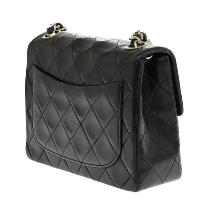 Chanel Vintage Mini Classic Flap Agnello Nero Hardware Oro – 17 cm - Etoilux