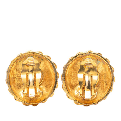 Chanel Orecchini Vintage Coco Figure Clip Metallo Placcato Oro — Anni 1970–1980 - Etoilux