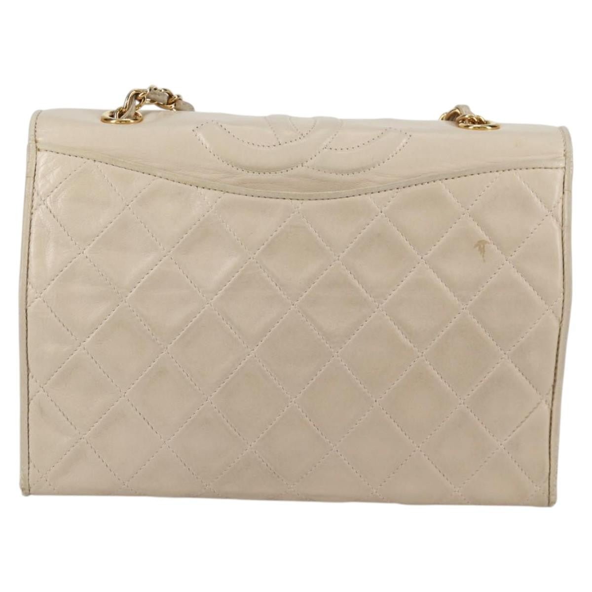 Chanel Vintage Mini Flap Bag con Nappina in Agnello Trapuntato – Oro - Etoilux