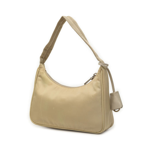 Prada Re-Edition 2000 Mini Bag Nylon Beige – 22 cm - Etoilux