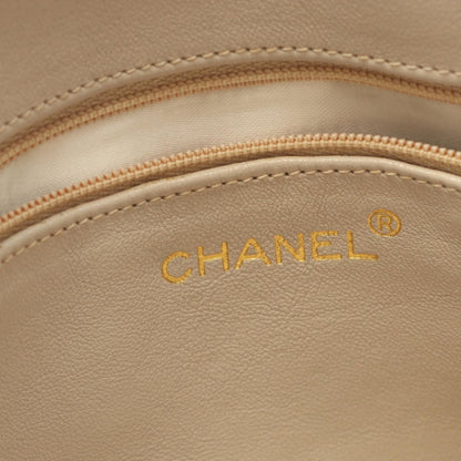 Chanel Camera Bag Vintage Caviar Beige Diamond Quilting & Nappa Tassel – 22 cm - Etoilux