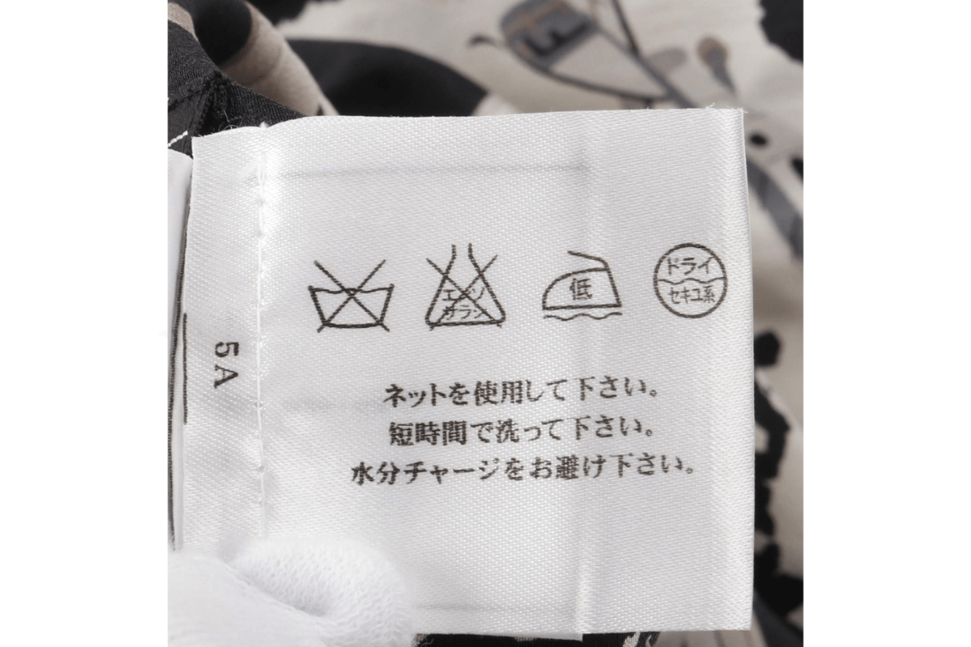 CHANEL – Gonna plissettata in pura seta con stampa aeronautica (Collezione 06P) Taglia: 42 IT Made in France - Etoilux