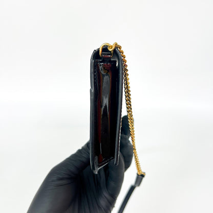 Saint Laurent Cassandre Wristlet in vernice nera - Etoilux
