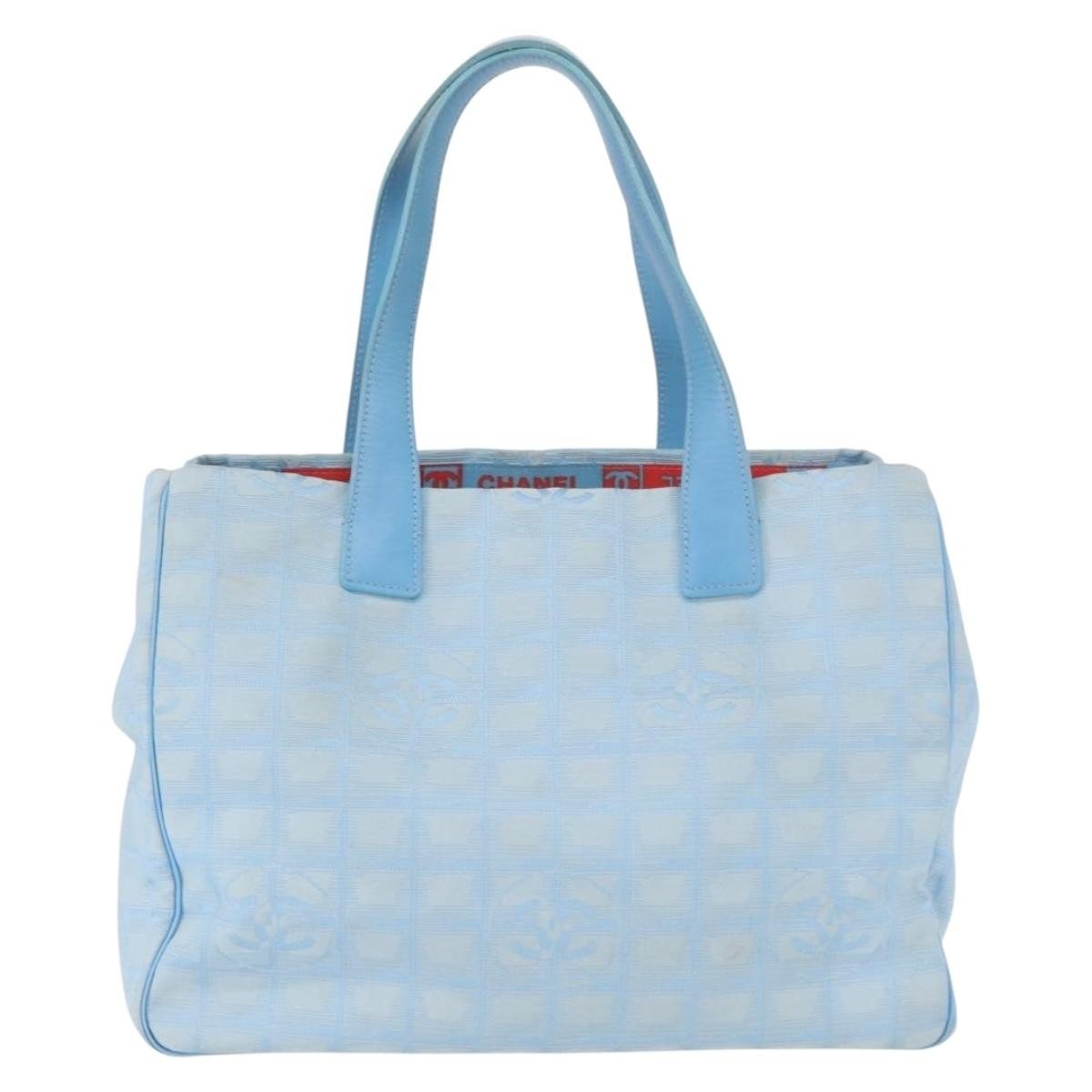 Chanel Travel Line tote media nylon jacquard blu cielo anni 2000 con monogramma CC e manico in pelle blu