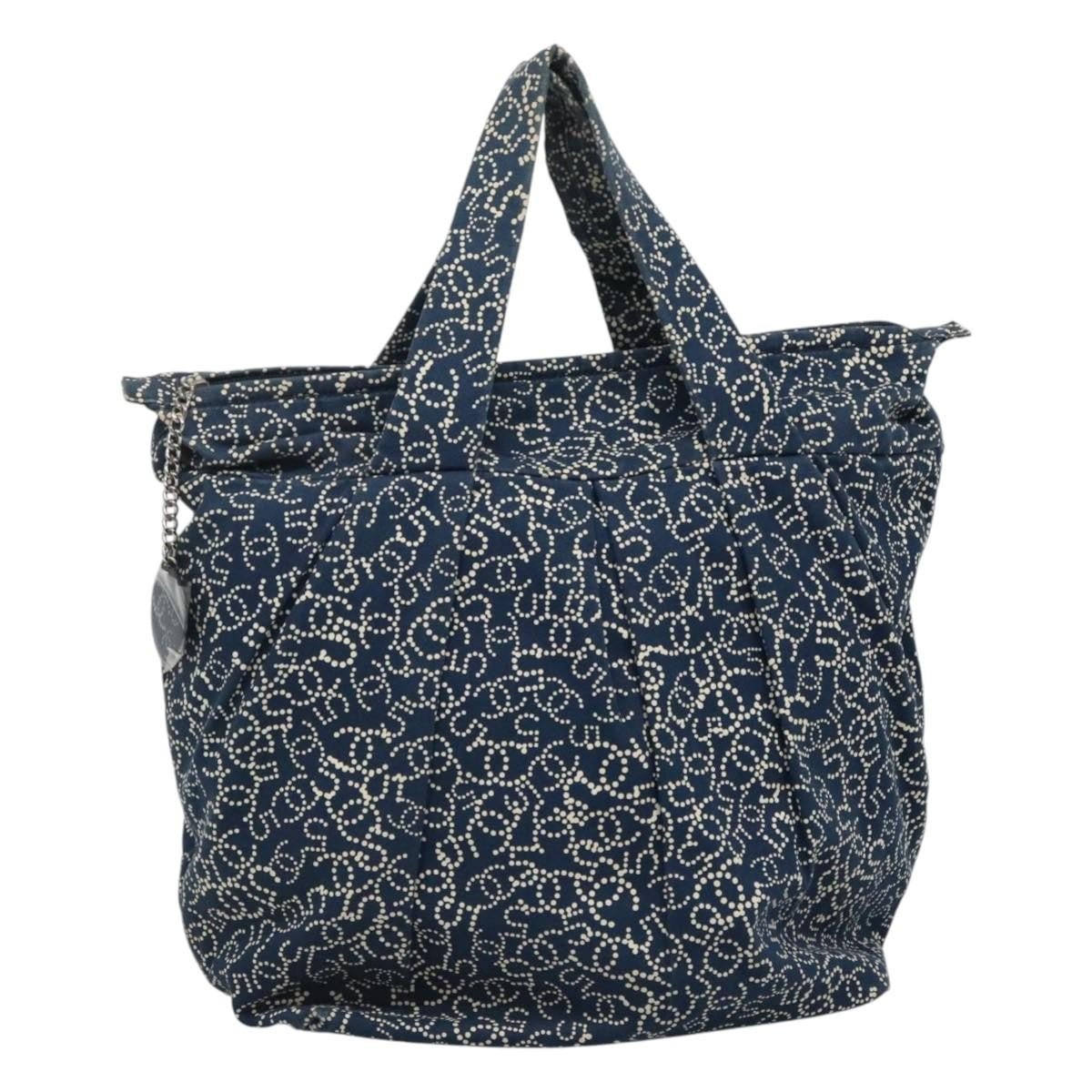 Chanel tote vintage grande tela stampata CC puntini bianchi blu navy anni 2000 con charm argentato e fodera logata