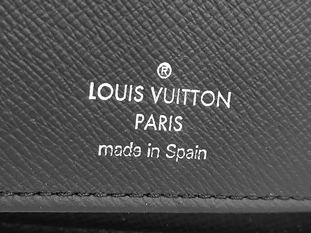 Louis Vuitton Zippy Verticale - Etoilux