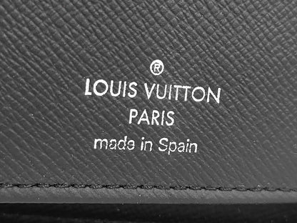 Louis Vuitton Zippy Verticale - Etoilux